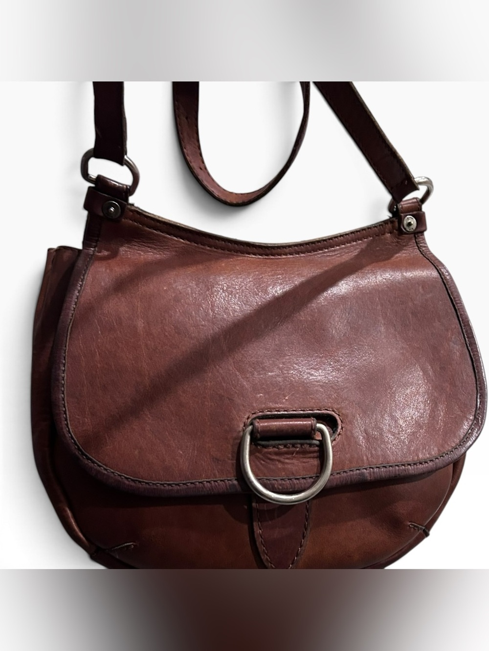 Fry brown leather saddle crossbody bag with D ring hardware closure